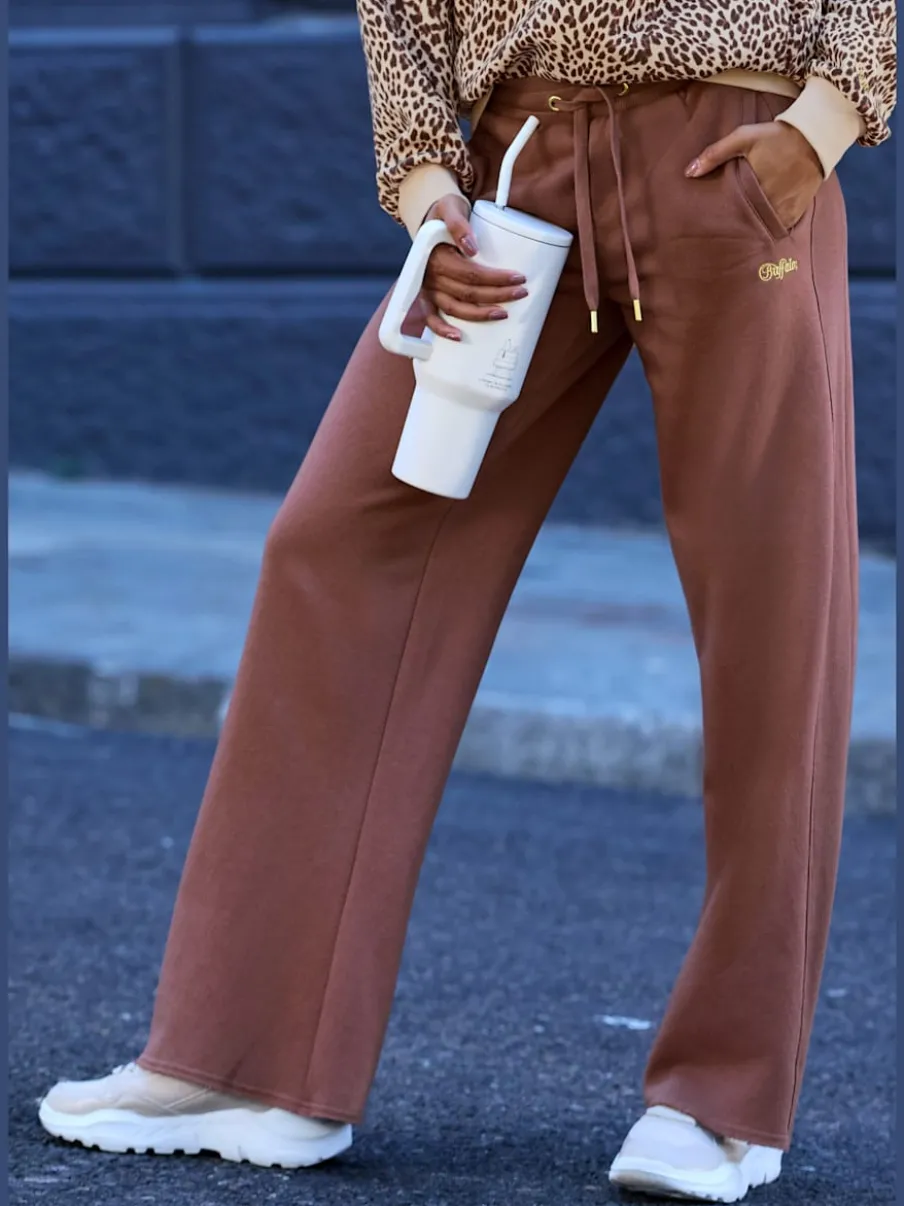 Pantalons moulants avec poches élastiques et empiècements côtelés