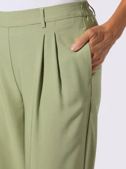 Pantalons à pinces avec ceinture élastique et poches