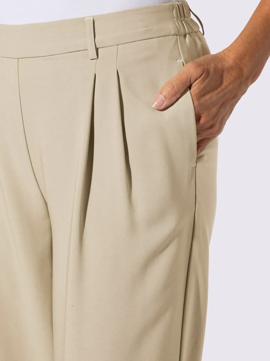 Pantalons à pinces avec ceinture élastique et poches