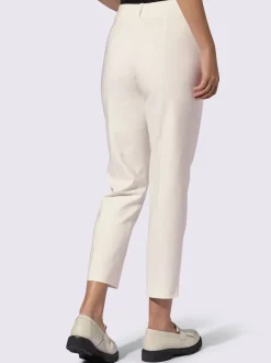 Pantalons près du corps avec petites pierres brillantes