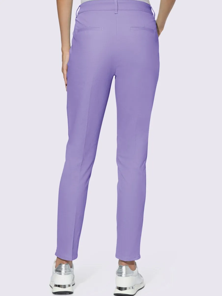 Pantalons skinny extensibles avec poches décoratives et fente