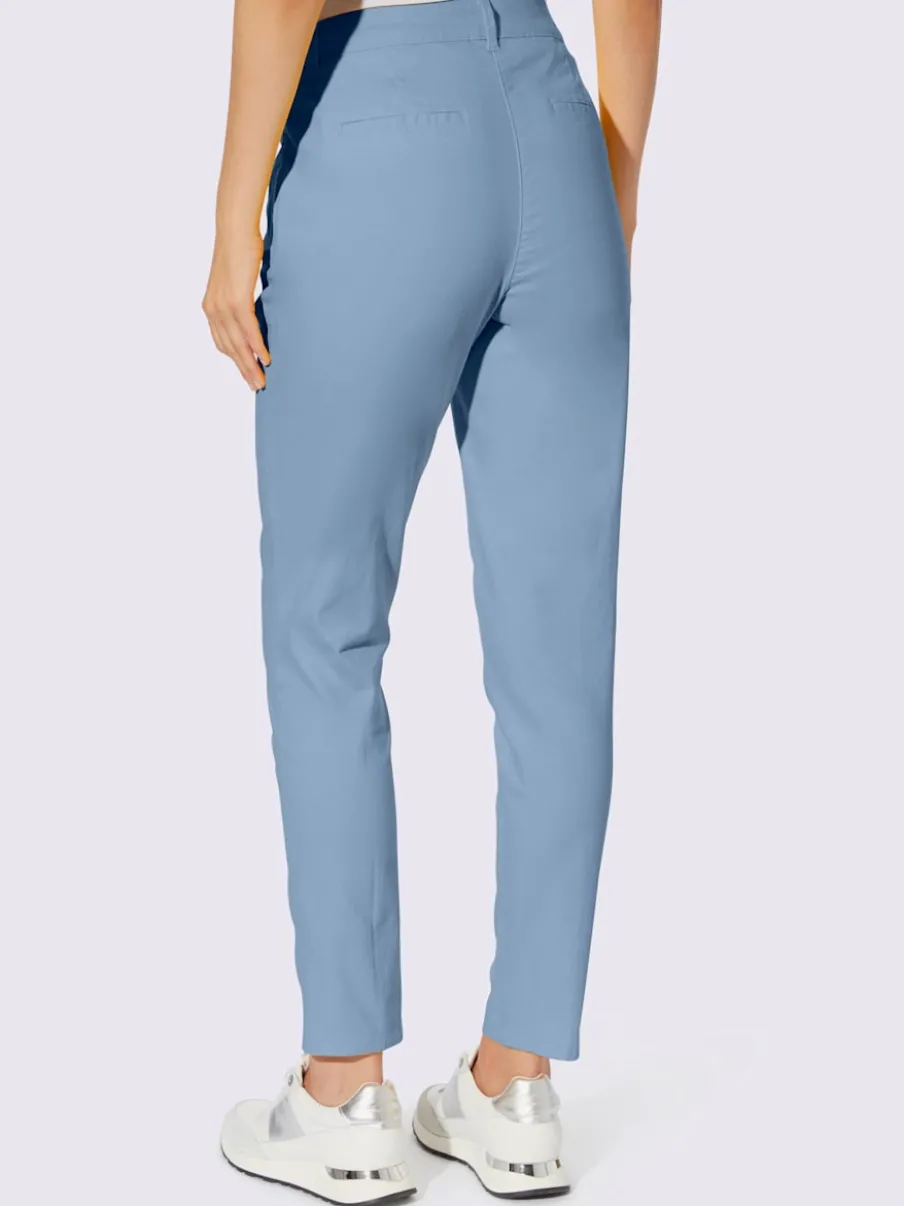 Pantalons skinny extensibles avec poches décoratives et fente