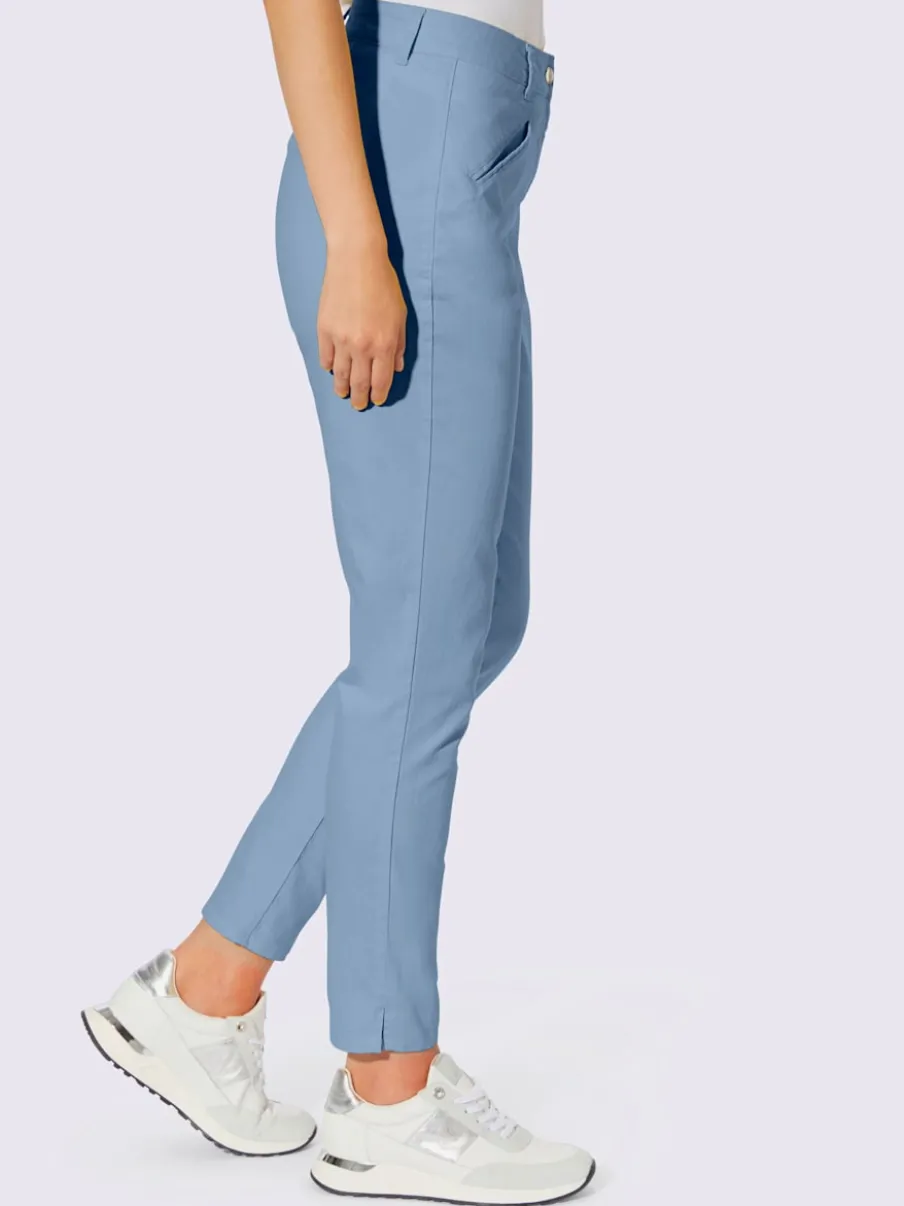 Pantalons skinny extensibles avec poches décoratives et fente