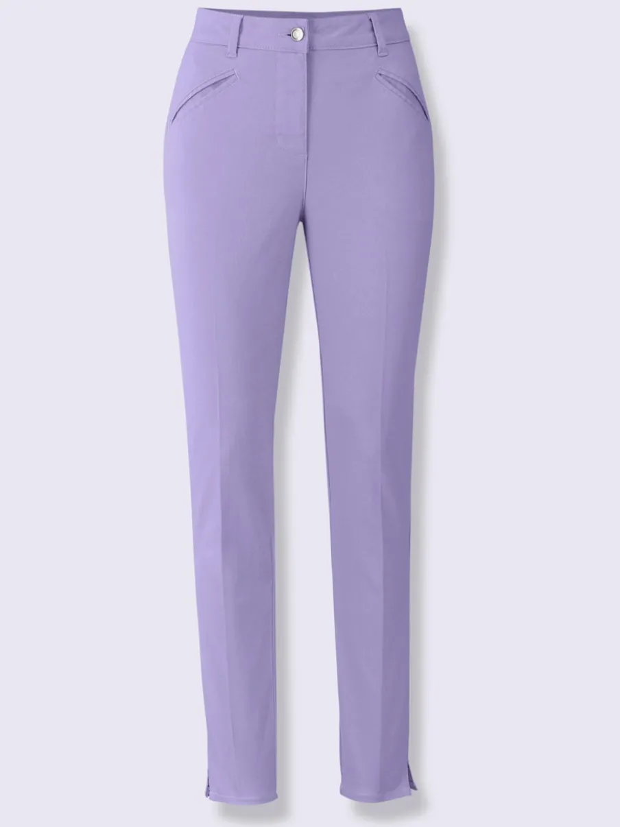 Pantalons skinny extensibles avec poches décoratives et fente