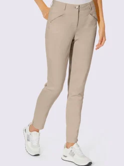 Pantalons skinny extensibles avec poches décoratives et fente