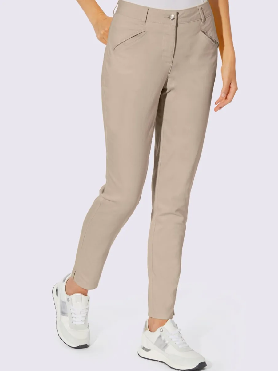 Pantalons skinny extensibles avec poches décoratives et fente