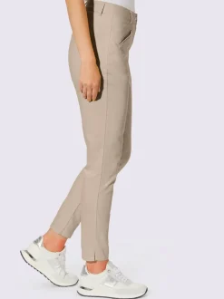 Pantalons skinny extensibles avec poches décoratives et fente
