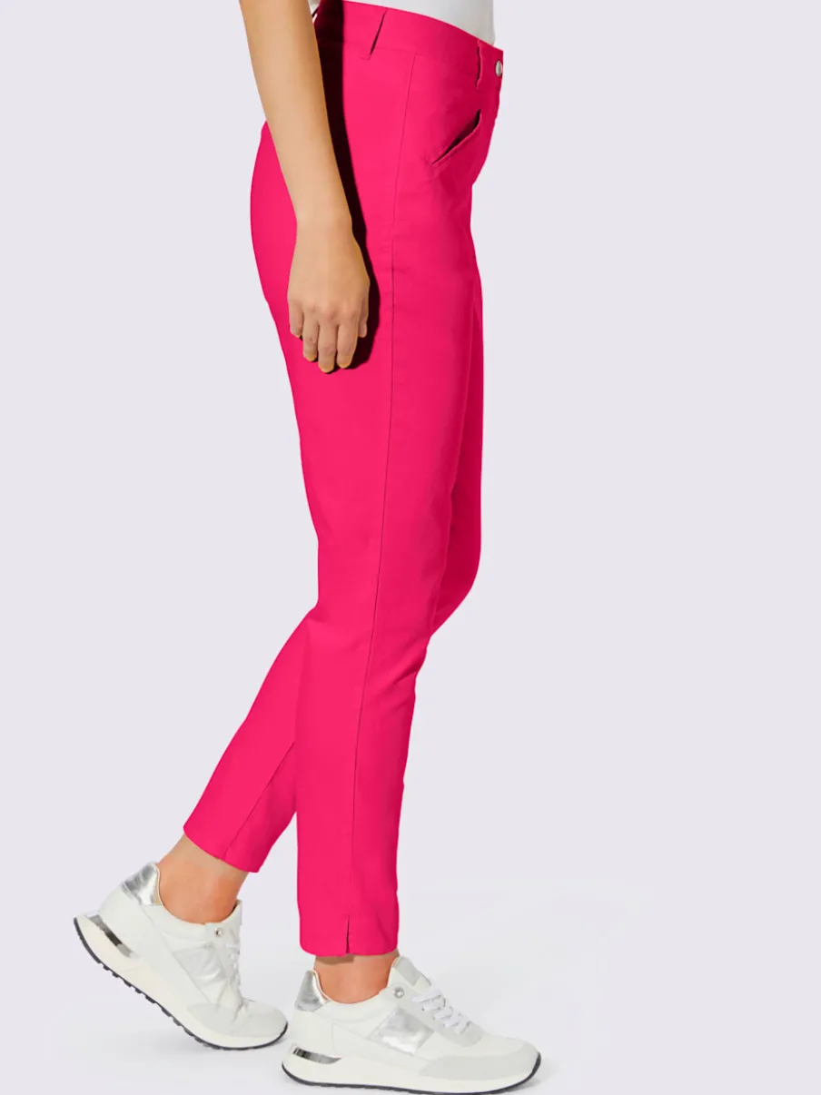 Pantalons skinny extensibles avec poches décoratives et fente