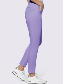 Pantalons skinny extensibles avec poches décoratives et fente