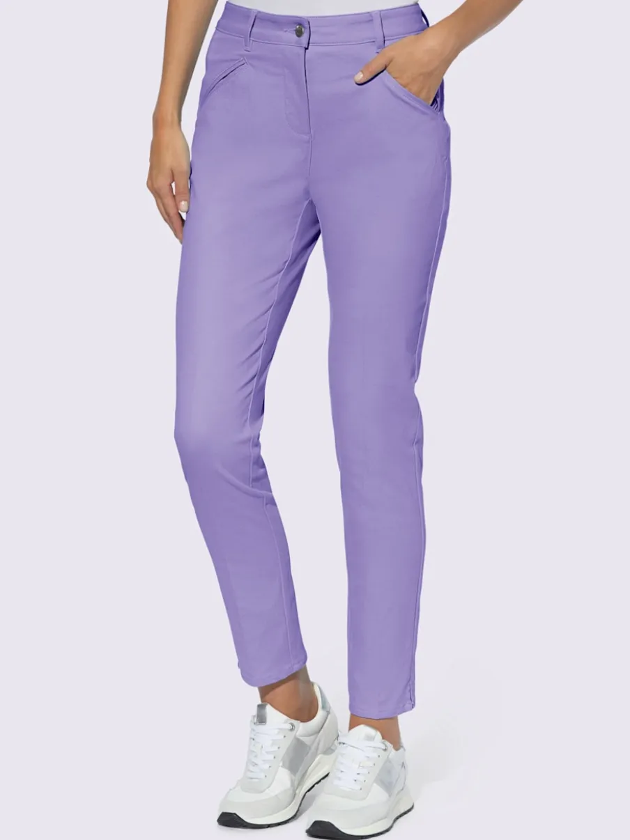 Pantalons skinny extensibles avec poches décoratives et fente