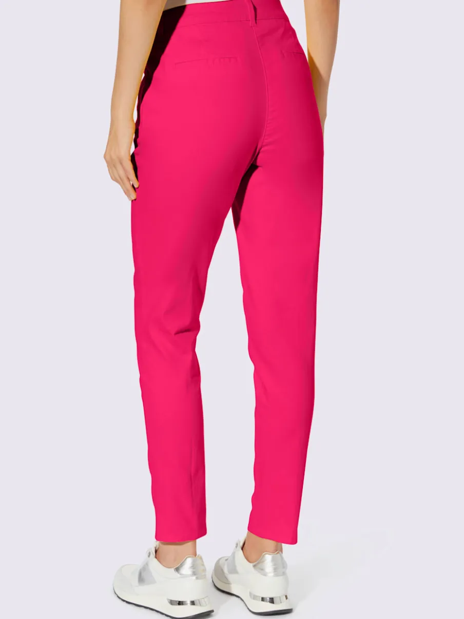 Pantalons skinny extensibles avec poches décoratives et fente