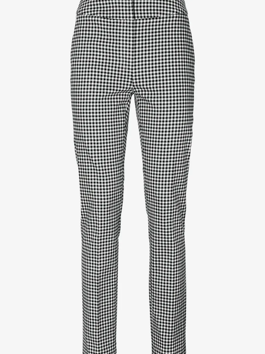Pantalons skinny à poches fendues et motif géométrique