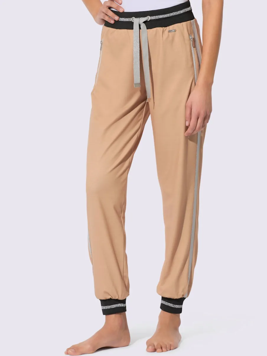 Pantalons sweat avec fils brillants et poches zippées
