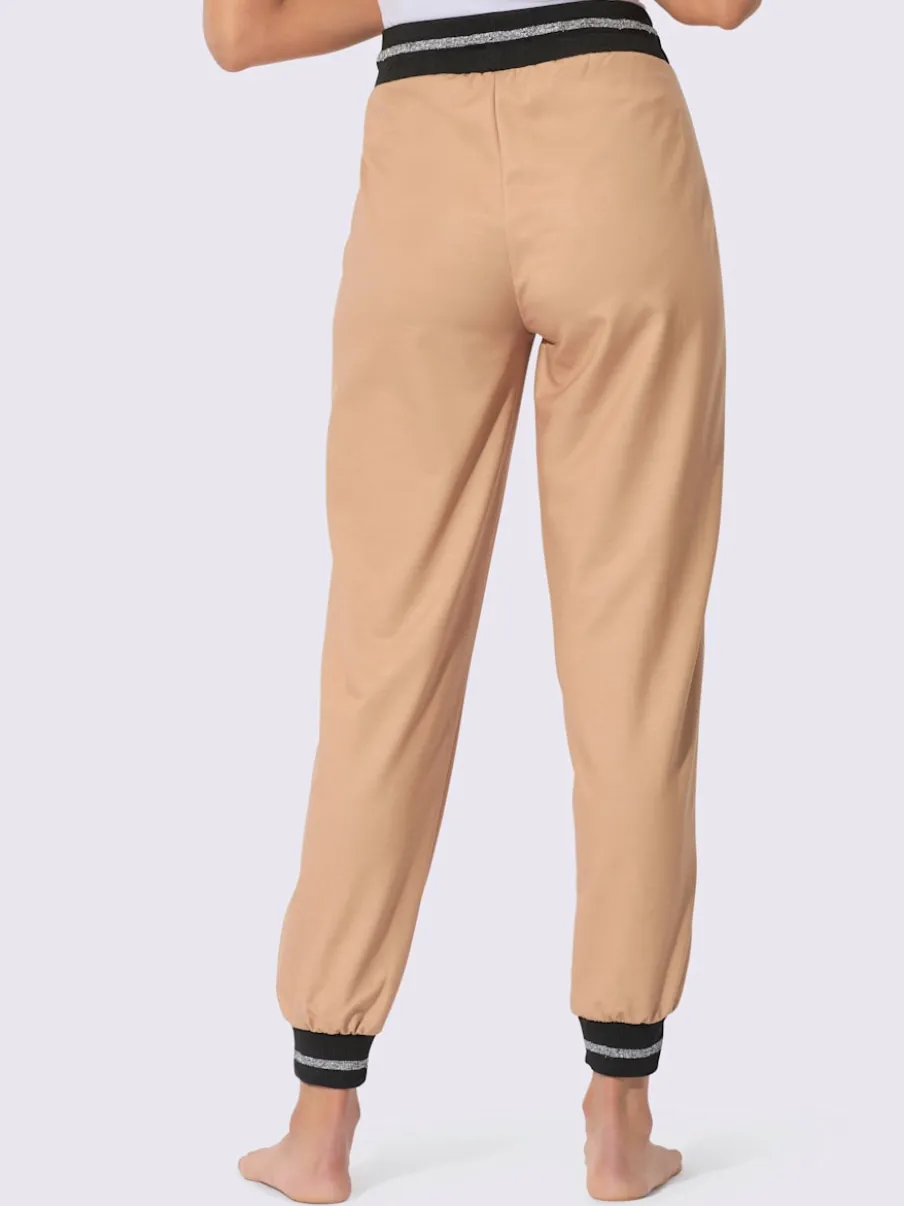 Pantalons sweat avec fils brillants et poches zippées