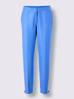 Pantalons tailleurs en soie avec poches et fermeture discrète