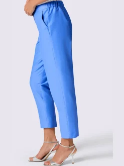 Pantalons tailleurs en soie avec poches et fermeture discrète