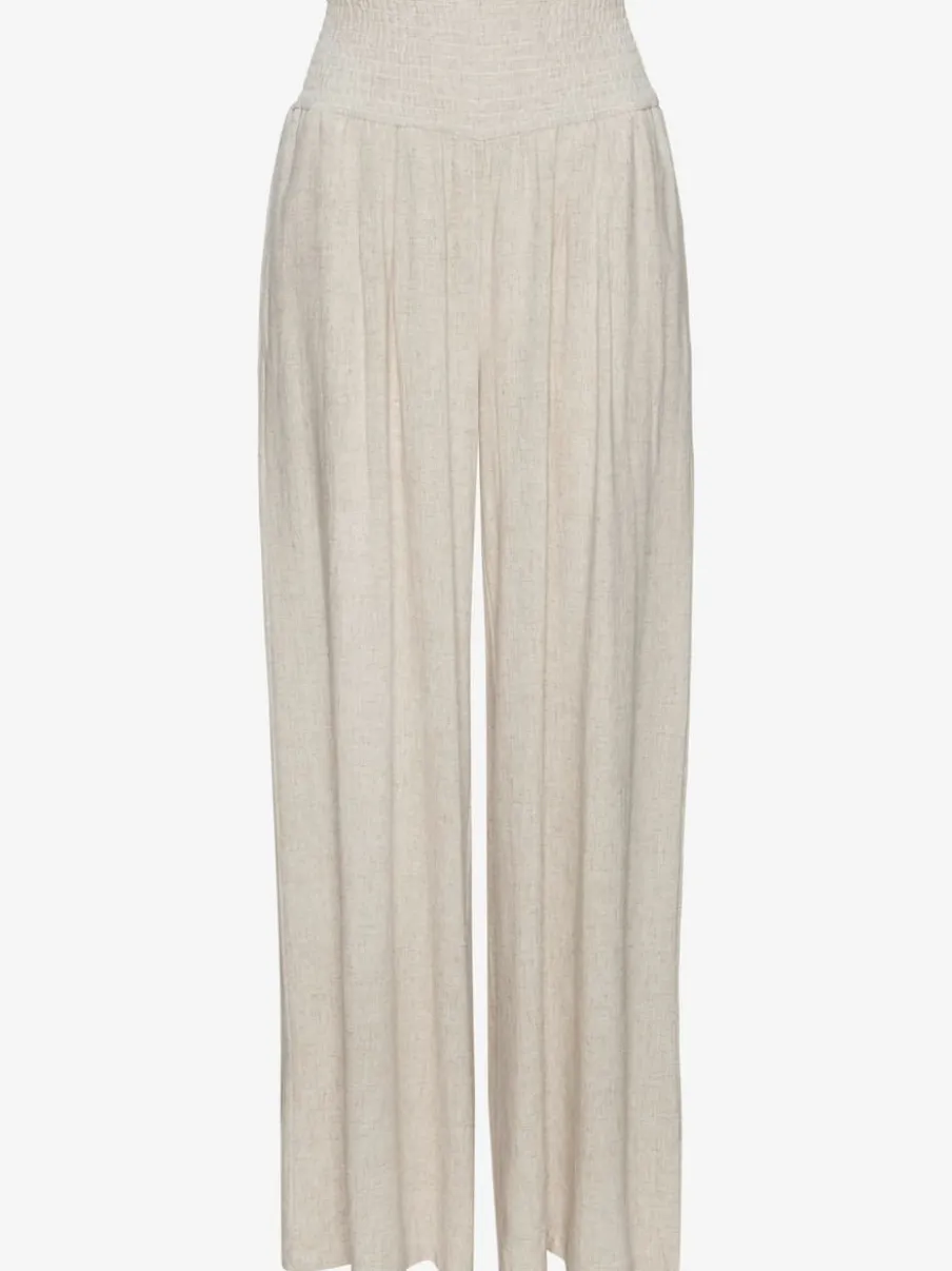 Pantalon structuré à ceinture smockée et poches latérales