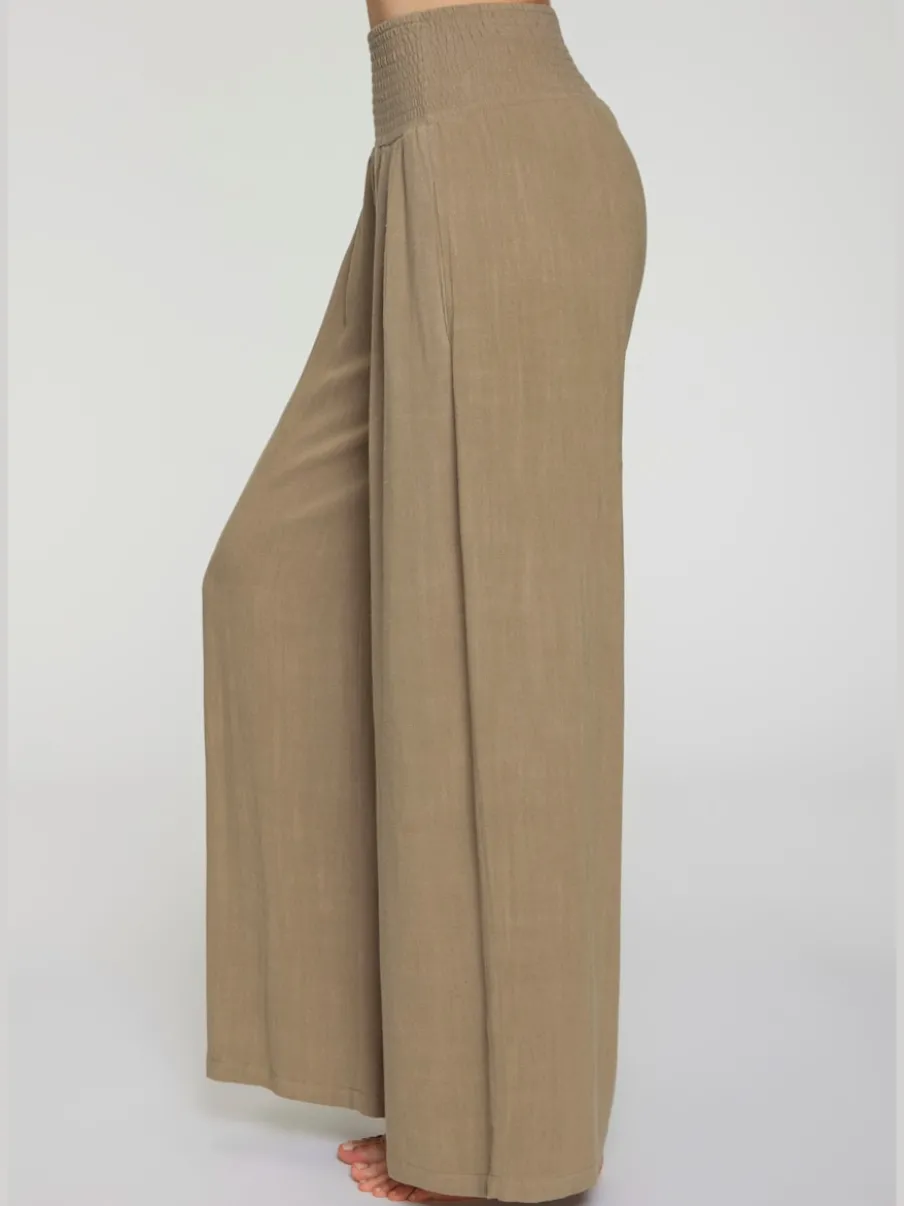 Pantalon structuré à ceinture smockée et poches latérales