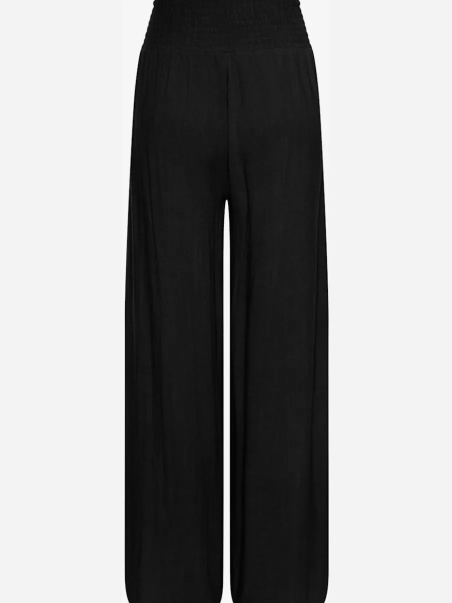 Pantalon structuré à ceinture smockée et poches latérales