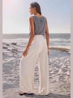 Pantalon structuré à ceinture smockée et poches latérales