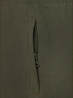 Pantalon sweat élastique doux avec poches à glissière et bords-côtes