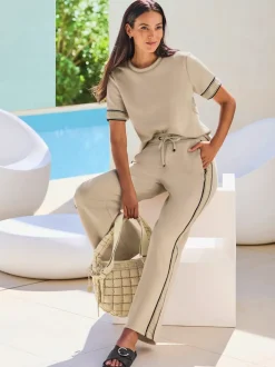 Pantalon sweat à rayures galon avec ceinture élastique et poches latérales