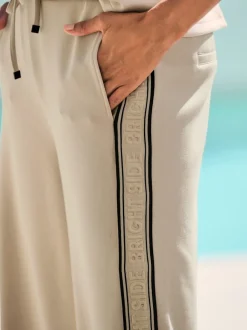 Pantalon sweat à rayures galon avec ceinture élastique et poches latérales