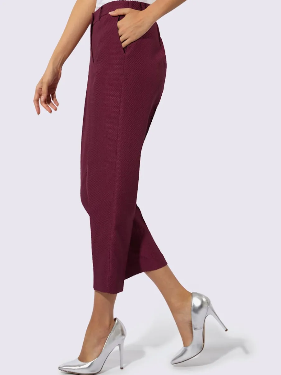 Pantalon tailleur ajusté en jacquard avec ceinture et poches latérales