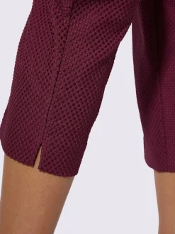 Pantalon tailleur ajusté en jacquard avec ceinture et poches latérales