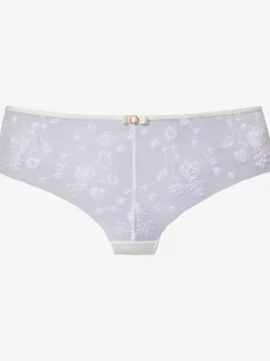 Panty fantaisie avec joli nœud décoratif et accessoire au centre devant