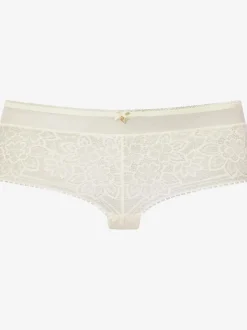 Panty fantaisie avec nœud décoratif fin et joli accessoire au centre devant