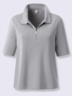 Polo à col zippé en mélange de matières douces et manches courtes