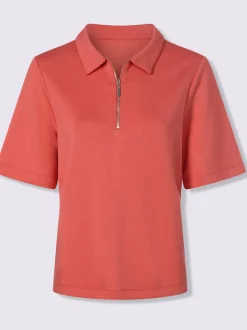 Polo à col zippé en mélange de matières douces et manches courtes