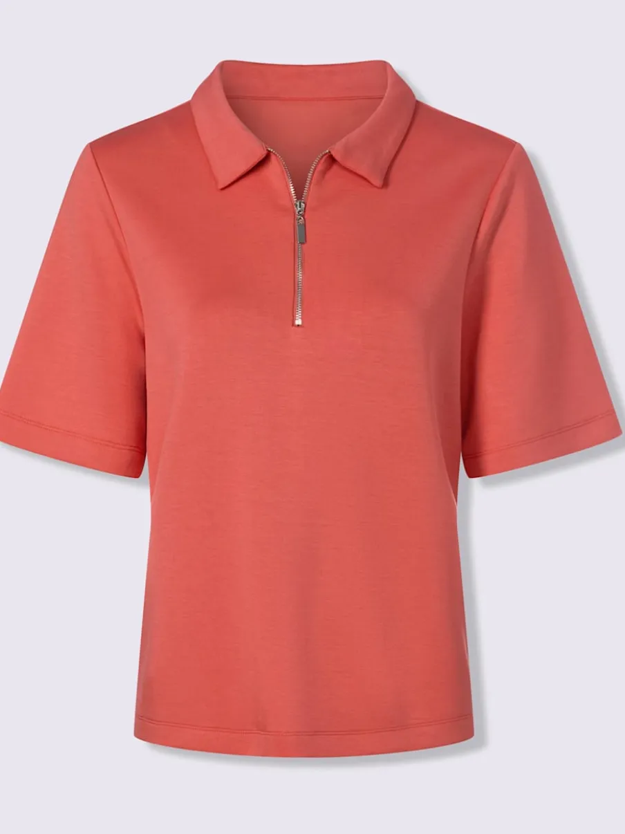 Polo à col zippé en mélange de matières douces et manches courtes