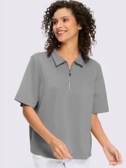 Polo à col zippé en mélange de matières douces et manches courtes