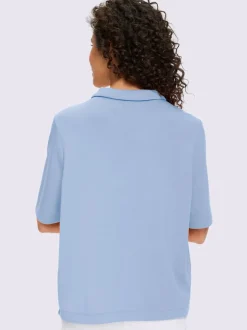 Polo à col zippé en mélange de matières douces et manches courtes