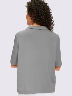 Polo à col zippé en mélange de matières douces et manches courtes