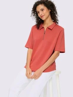 Polo à col zippé en mélange de matières douces et manches courtes