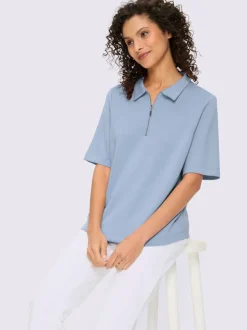Polo à col zippé en mélange de matières douces et manches courtes