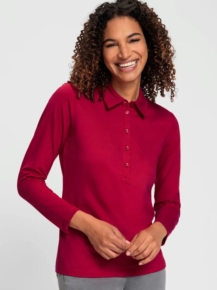 Polo en coton doux à patte de boutonnage manches longues