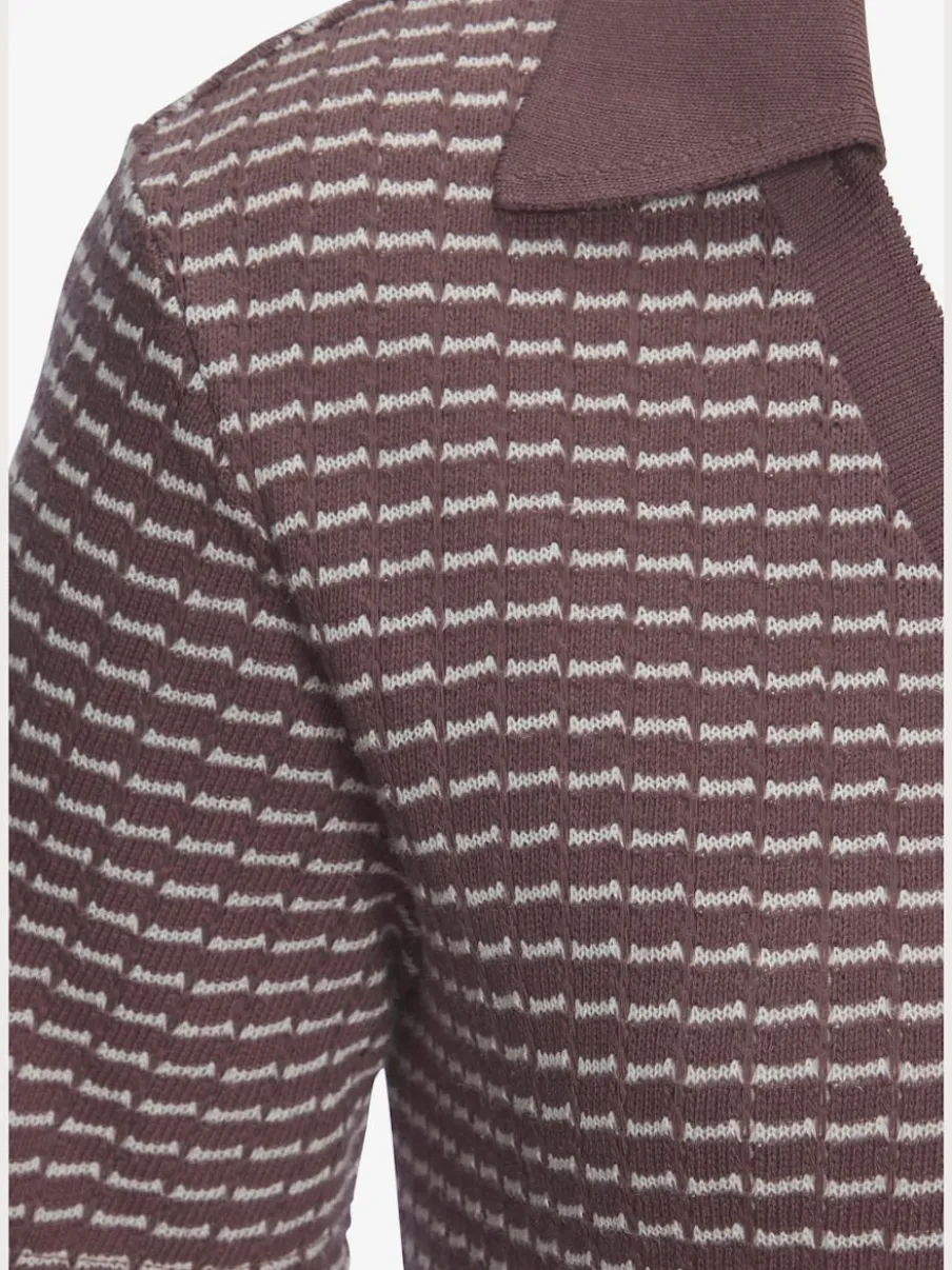 Polo en tricot à col V et manches courtes avec joli motif bicolore
