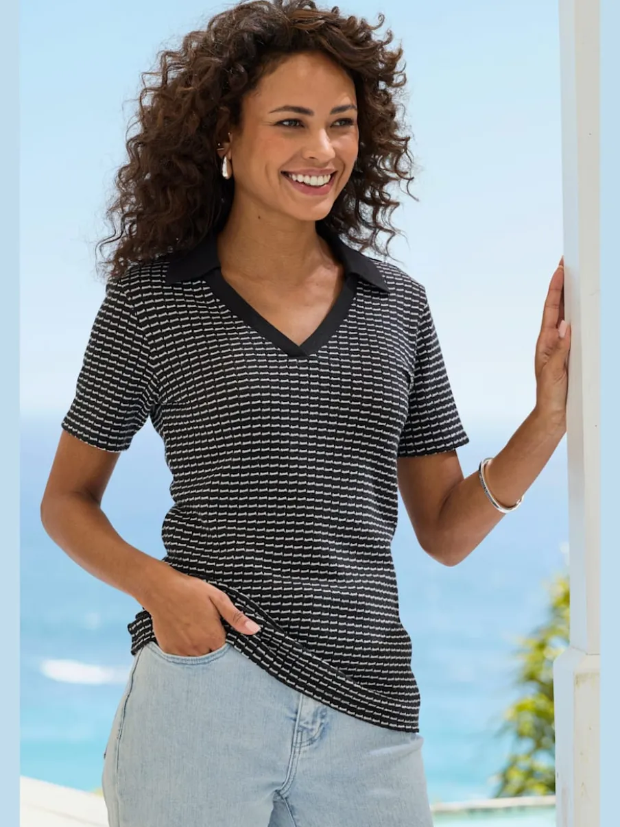 Polo en tricot à col V et manches courtes avec joli motif bicolore