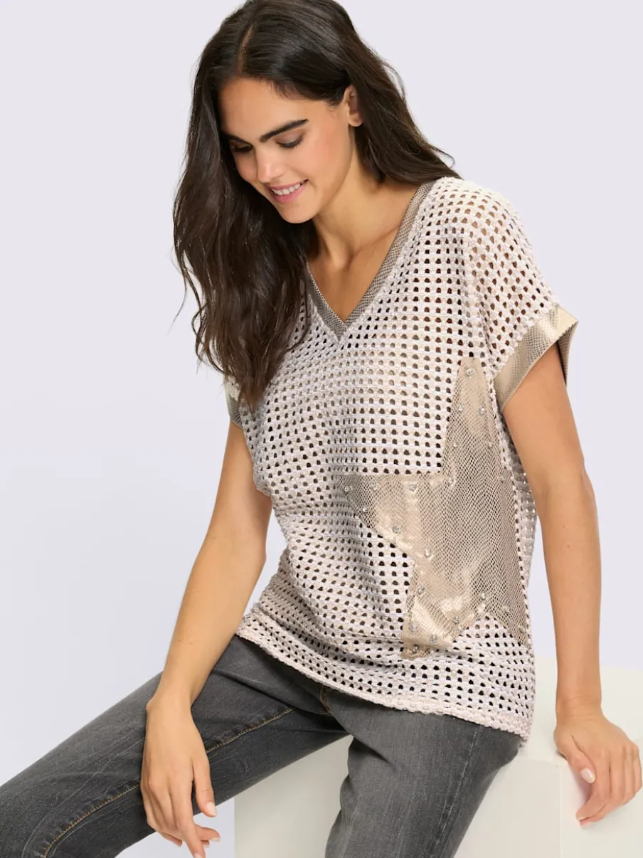 Pull ajouré avec col en V et manches courtes à motif ajouré