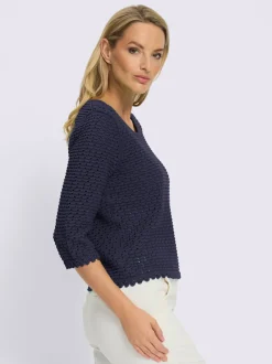 Pull ajouré léger à manches trois quart avec bords ondulés