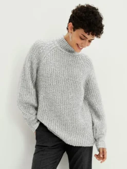 Pull ample à col montant et manches raglan élastiques