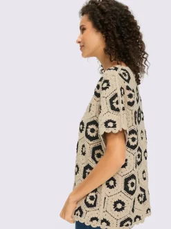 Pull ample en dentelle fleuri avec encolure ronde et manches courtes