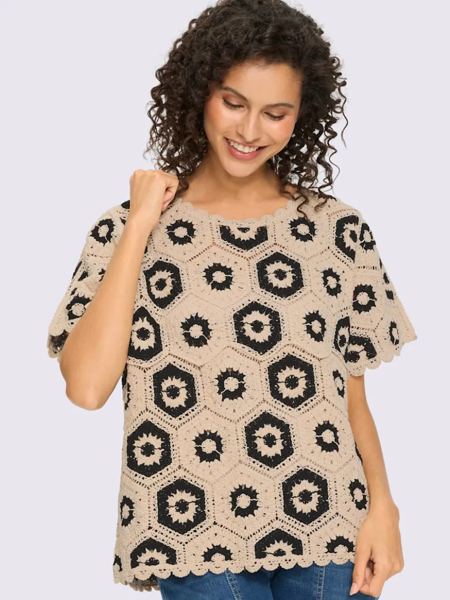 Pull ample en dentelle fleuri avec encolure ronde et manches courtes