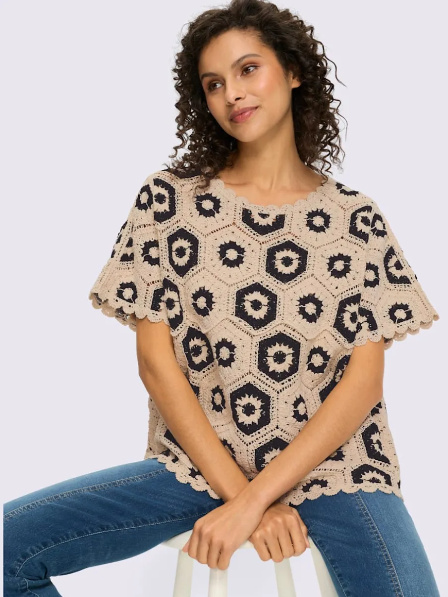 Pull ample en dentelle fleuri avec encolure ronde et manches courtes