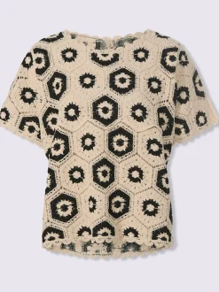Pull ample en dentelle fleuri avec encolure ronde et manches courtes