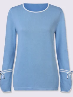 Pull au col rond avec finitions élégantes et doux nœuds